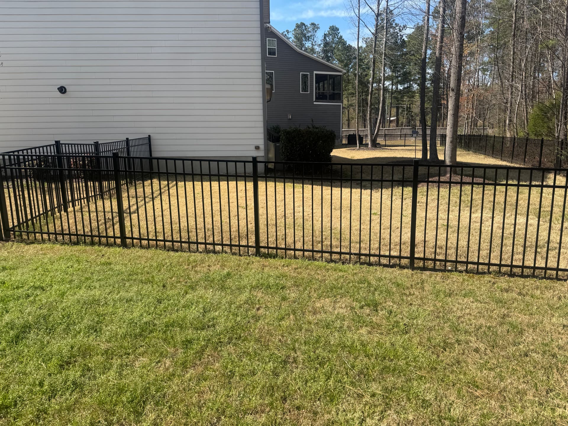 Gallery photos for Custom Black Metal Fence Installation That Looks Sharp and Holds Up: Image #1