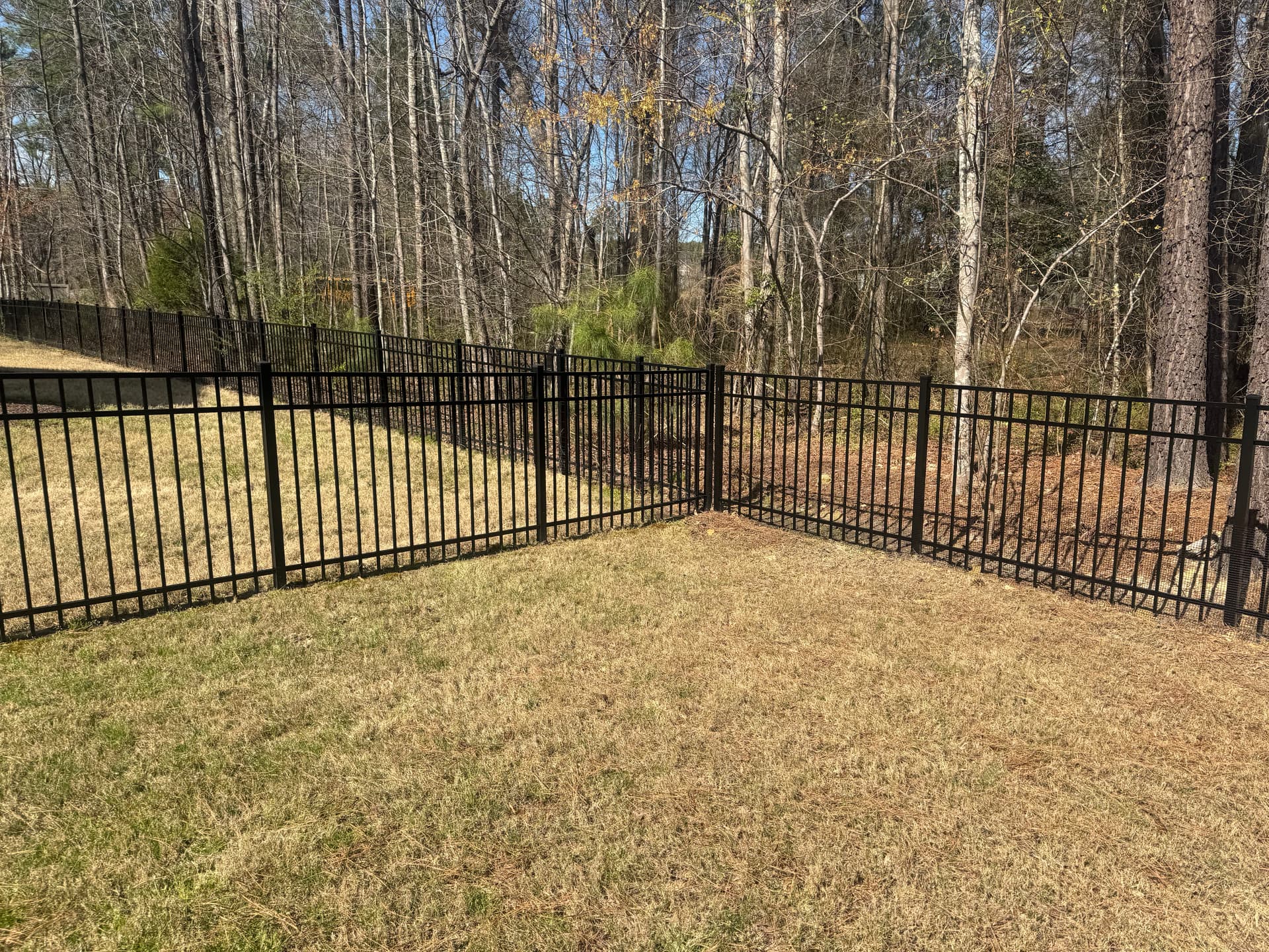 Custom Black Metal Fence Installation That Looks Sharp and Holds Up image