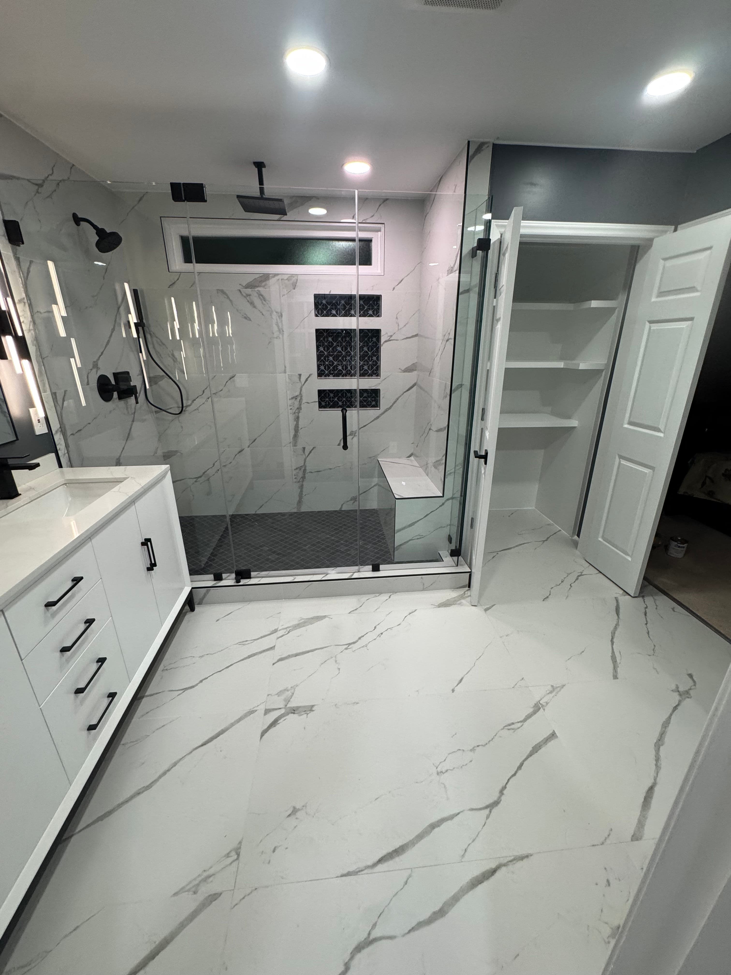 Project Master Bath and Closet Renovation with Custom Tile and Built-In Storage image