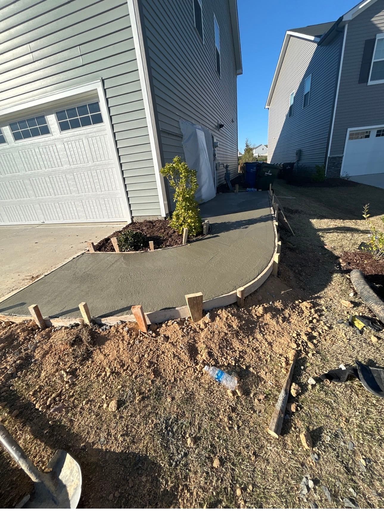 Gallery photos for Custom Gemstone Patio, Stone Bench and Concrete Walkway Build: Image #1