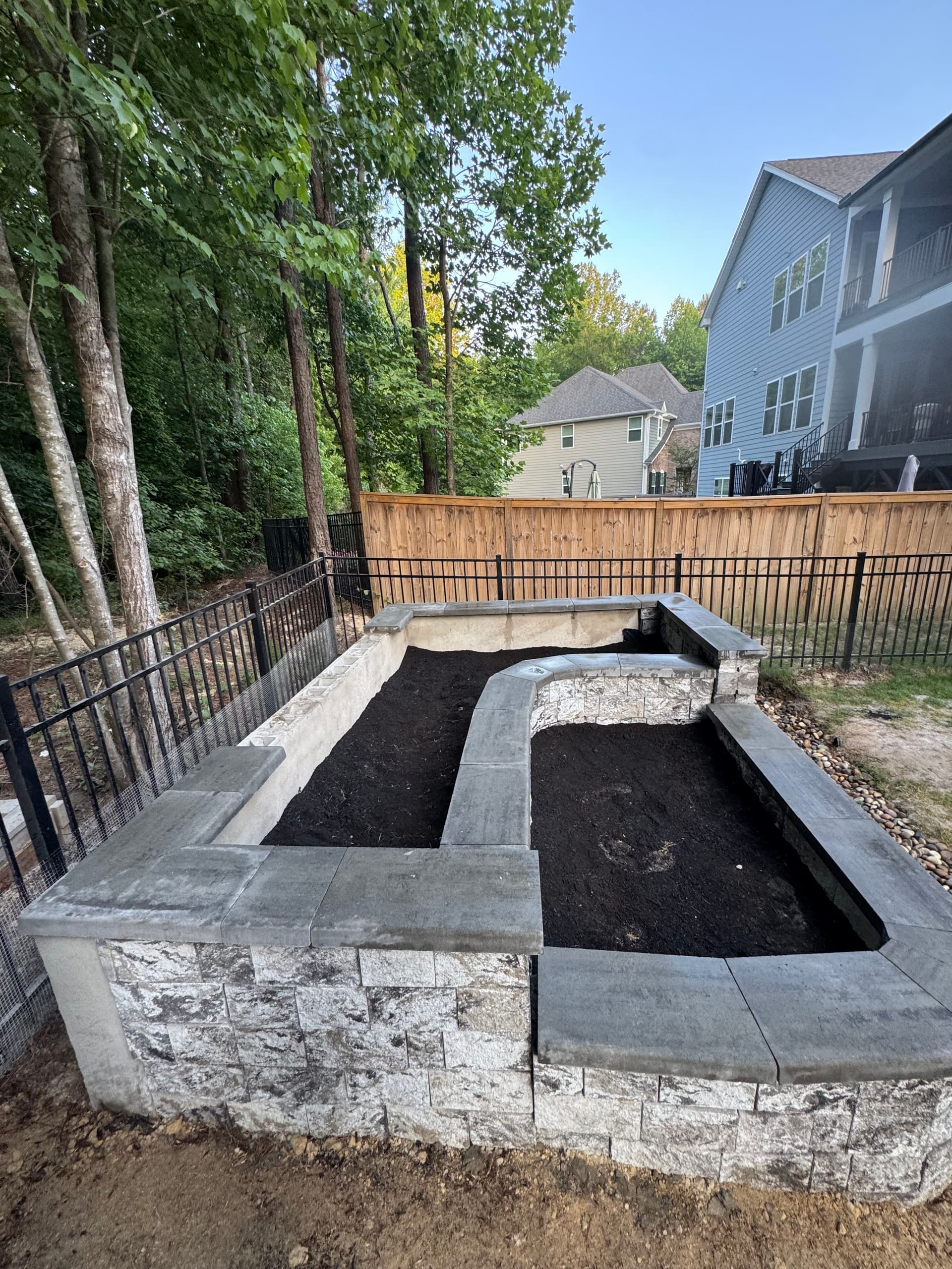 Gallery photos for Custom Stone Garden Bed Build with Dedicated Herb and Vegetable Planting Spaces: Image #9