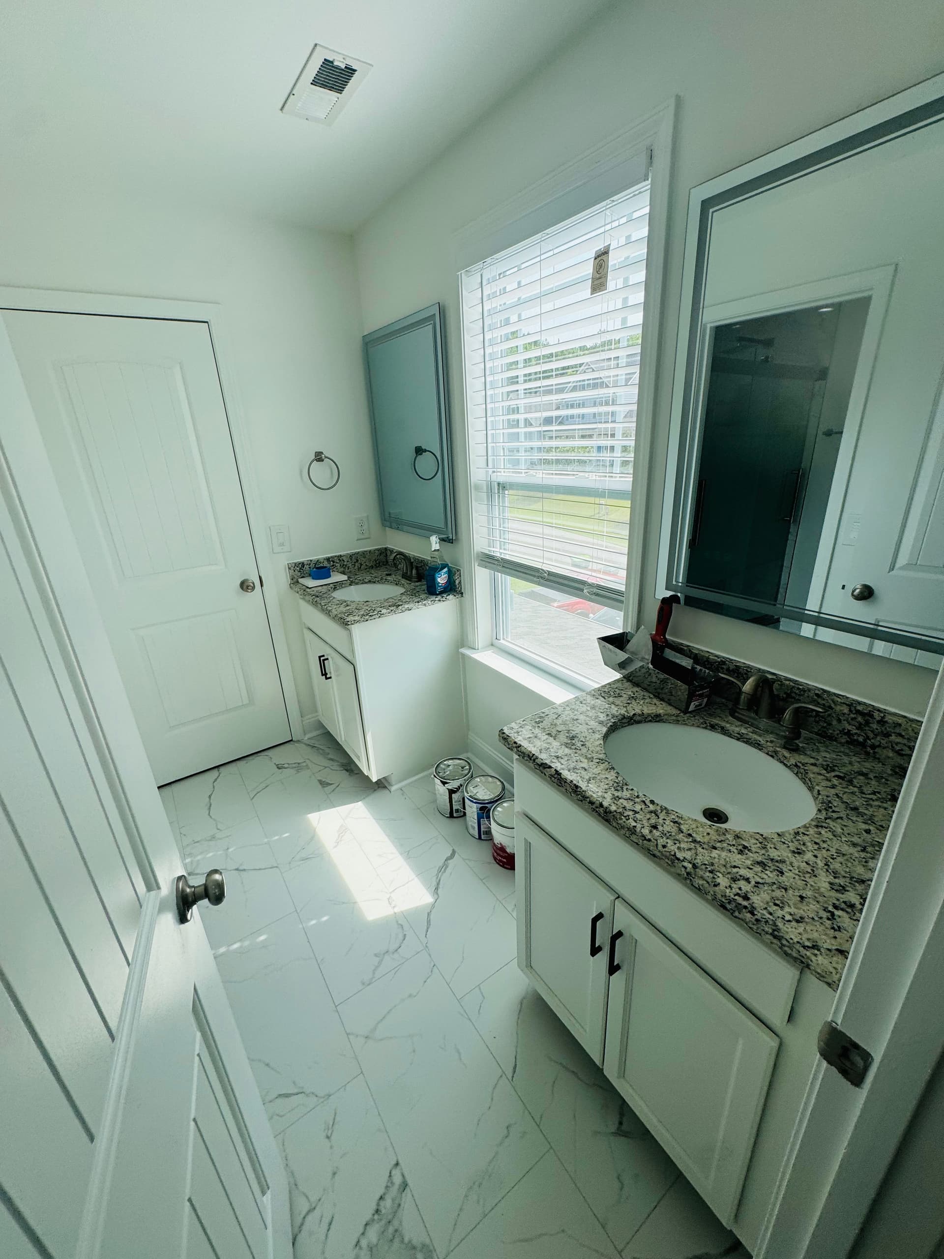 Two Bathroom Remodels with High-End Ceramic and Modern Finishes image
